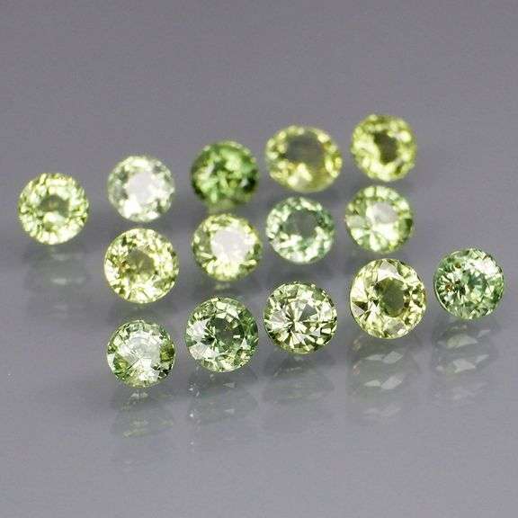 Fantastic 4.82ct diamond cut GREEN Sapphire set