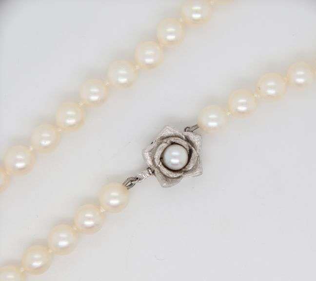 Elegant White Fresh water Pearl Necklace with 14kt White Gold Flower Clasp