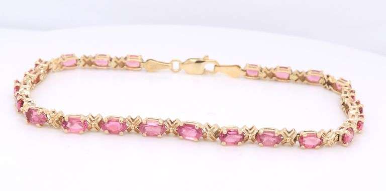 Handsome Yellow Gold oval Pink Tourmaline XO Bracelet