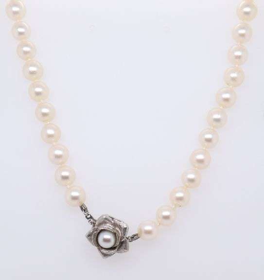 Elegant White Fresh water Pearl Necklace with 14kt White Gold Flower Clasp