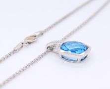 Charming White Gold Blue Topaz and Diamond Pendant on Rope Chain