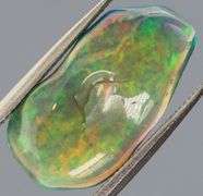 High fire collectors 3.53ct free form black Opal vein