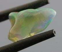 High fire collectors 3.07ct free form black Opal vein