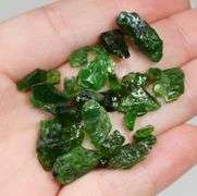 Rich forest green 50ct rough Chrome Diopside set