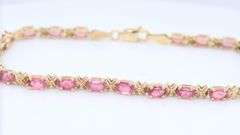 Handsome Yellow Gold oval Pink Tourmaline XO Bracelet