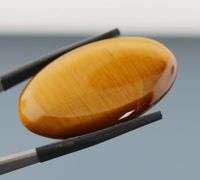 Full body shimmer! 42.58ct Golden Tiger Eye cabochon