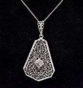 Interesting Diamond Pendant Necklace In 14K White Gold