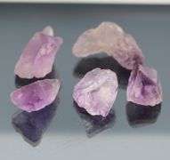 Collectors untreated 203.92ct uncut Amethyst set