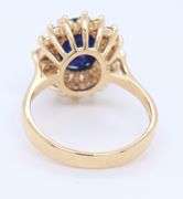 Fabulous Yellow Gold Oval Blue Sapphire and Diamond Halo Ring