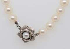 Elegant White Fresh water Pearl Necklace with 14kt White Gold Flower Clasp