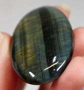 Dramatic 132ct Tiger Eye cabochon
