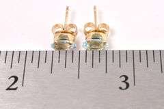 Blue Topaz Stud Earrings In Sterling Silver