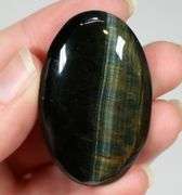 Dramatic 132ct Tiger Eye cabochon