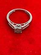 LADIES 14K WHITE GOLD AND DIAMOND RING