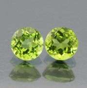Gorgeous 1.18ct heavy flashing Peridot pair