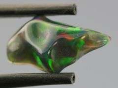Gorgeous 2.25ct free form black Opal vein