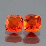 Vibrant top color .97ct bright orange Fire Opal pair