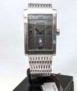 Gucci men's wristwatch 8600M Automatic Swiss Made NEW with tags box and papers