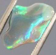 High fire collectors 2.68ct free form black Opal vein