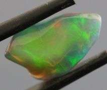 High fire collectors 3.07ct free form black Opal vein