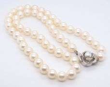 Elegant White Fresh water Pearl Necklace with 14kt White Gold Flower Clasp