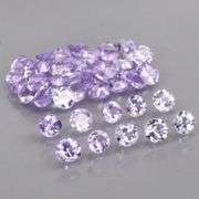 Heavy flashing 4.25ct diamond cut Tanzanite set