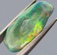 High fire collectors 3.53ct free form black Opal vein