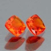 Vibrant top color .97ct bright orange Fire Opal pair
