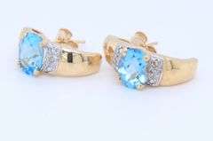 Blue Topaz and White Sapphire Pendant with Aquamarine and Sapphire Earrings