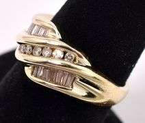 Beautiful Diamond Twist Ring in 14K Yellow Gold