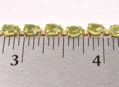 Amazing Peridot Gem Tennis Bracelet In 14K Yellow Gold