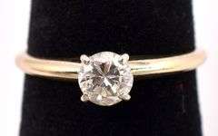 Elegant Solitaire Diamond Ring In 14K Yellow Gold