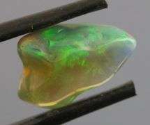 High fire collectors 3.07ct free form black Opal vein