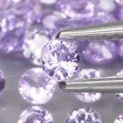 Heavy flashing 4.25ct diamond cut Tanzanite set