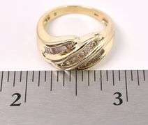 Beautiful Diamond Twist Ring in 14K Yellow Gold