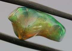 High fire collectors 5.92ct free form black Opal vein