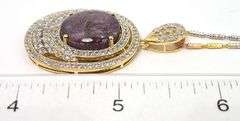Beautiful Massive 23.79 Carat Ruby and White Sapphire Pendant with Yellow Gold Overlay.