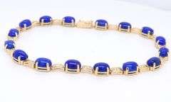 Attractive Yellow Gold Oval Lapis and Greek Key Station Bracelet