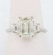 Emerald & Trapezoid Diamond Engagement Ring