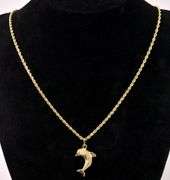 Acrobatic Dolphin Pendant Necklace In 14K Yellow Gold