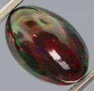 Magnificent 2.37ct full body flashing Black Opal