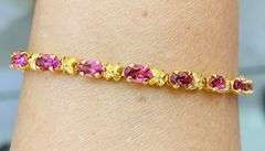 14kt Solid Yellow Gold & Pink Topaz Bracelet- 12.00 CARATS!