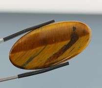 Unique! 51.39ct Golden Tiger Eye cabochon