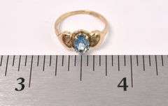 Beautiful Blue Topaz Baby Ring In Yellow Gold