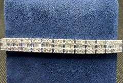 CLASSIC AND GORGEOUS 14K WHITE GOLD BAGUETTE AND ROUND BRILLIANT CUT DIAMOND TENNIS BRACELET