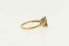 10K Yellow Gold Heart Blue Topaz Syn. Sapphire Bypass Ring