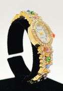 Ladies Geneva & Gemstone Watch, 18kt Yellow GP Cuff