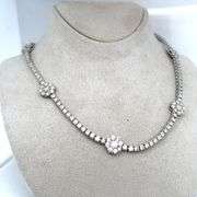 9CARAT! DIAMOND NECKLACE WITH 7 FLOWERS