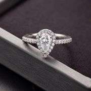 Sparkling 1 Ct Pear Cut White E-F Moissanite Ring