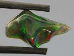 Gorgeous 2.25ct free form black Opal vein